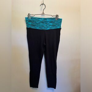 SO, girls youth leggings with blue tiger stripped wide waist band.